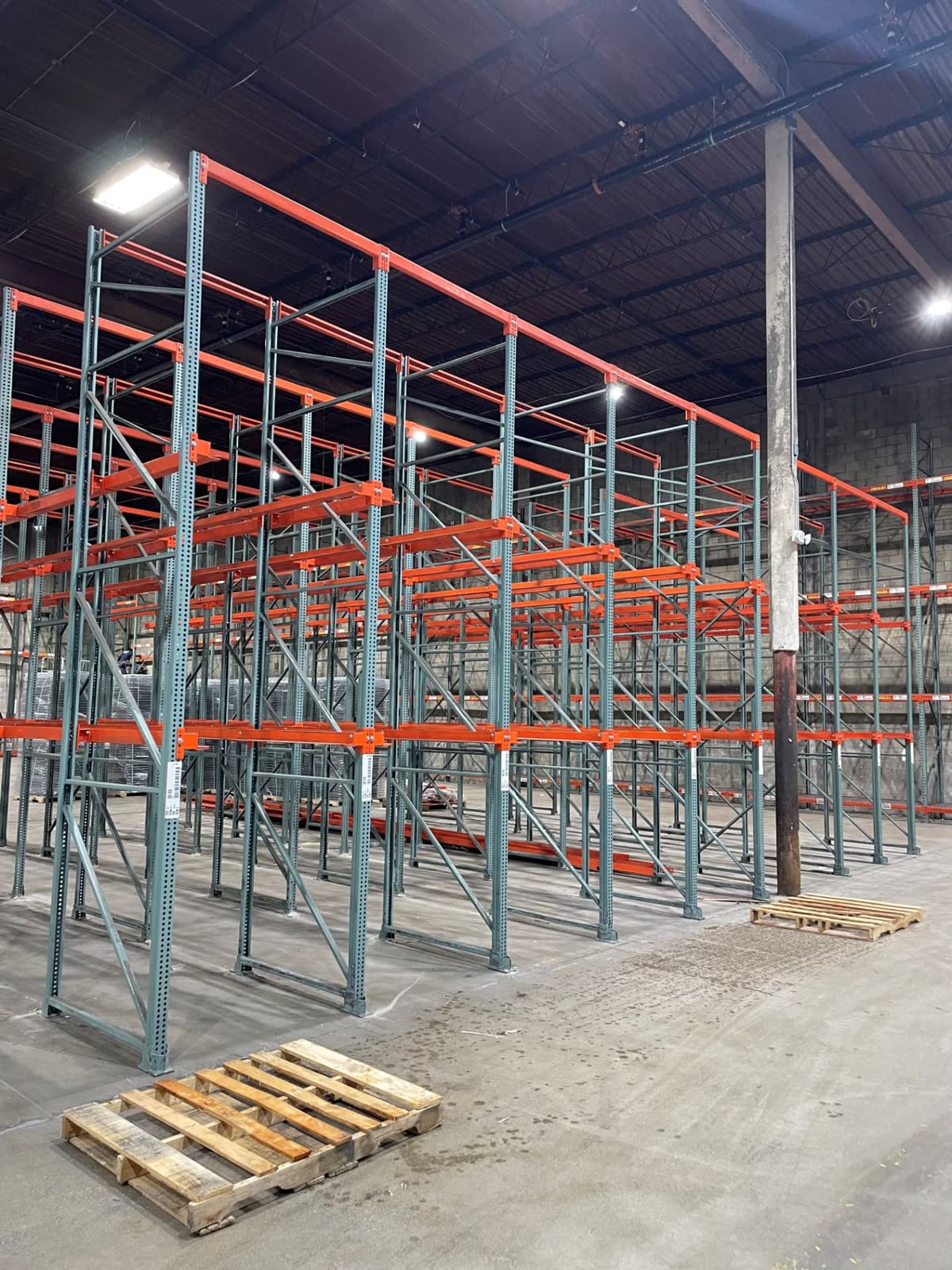Drive-in pallet rack installation in a high-bay warehouse